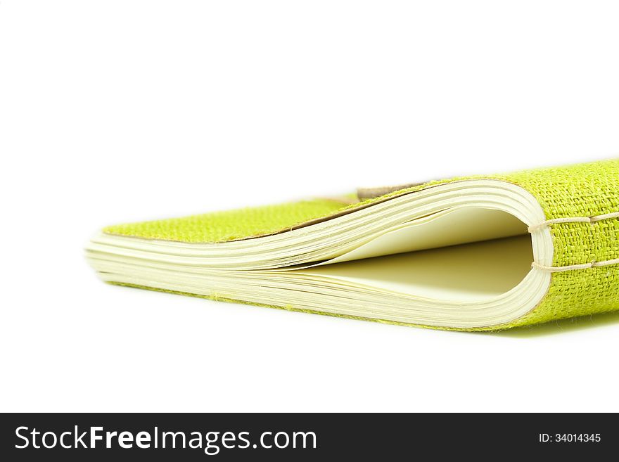 Notebook with a green cover isolated on a white background. Notebook with a green cover isolated on a white background
