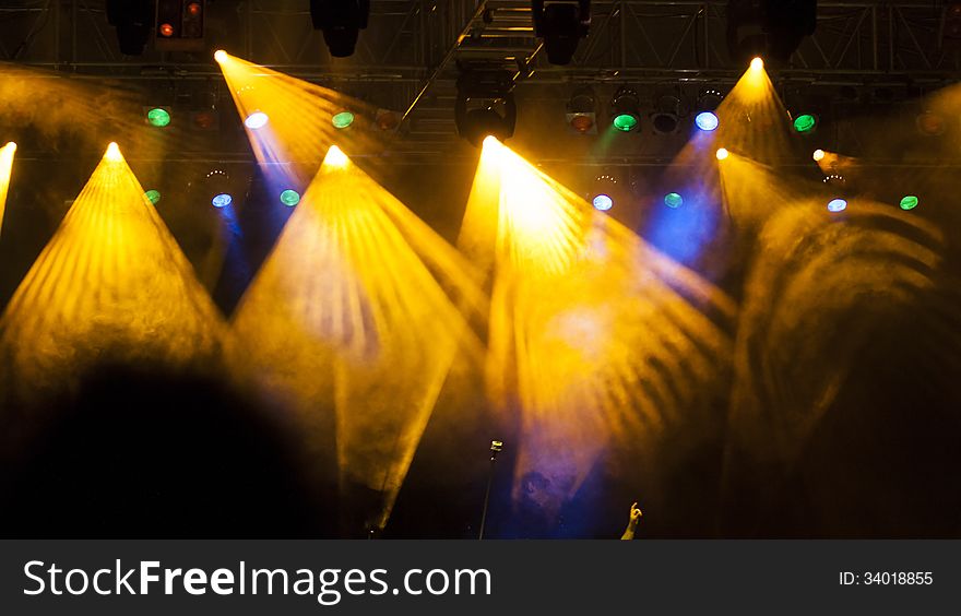 Stage lights and reflectors during concert. Stage lights and reflectors during concert