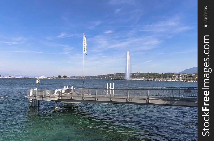 Portrait view of Geneva's Jet d'Eau (Water Jet) and platform. Portrait view of Geneva's Jet d'Eau (Water Jet) and platform