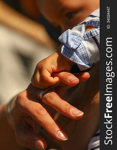 Baby Holding Mother Finger