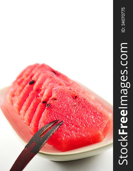 Fresh slices of red watermelon on white background