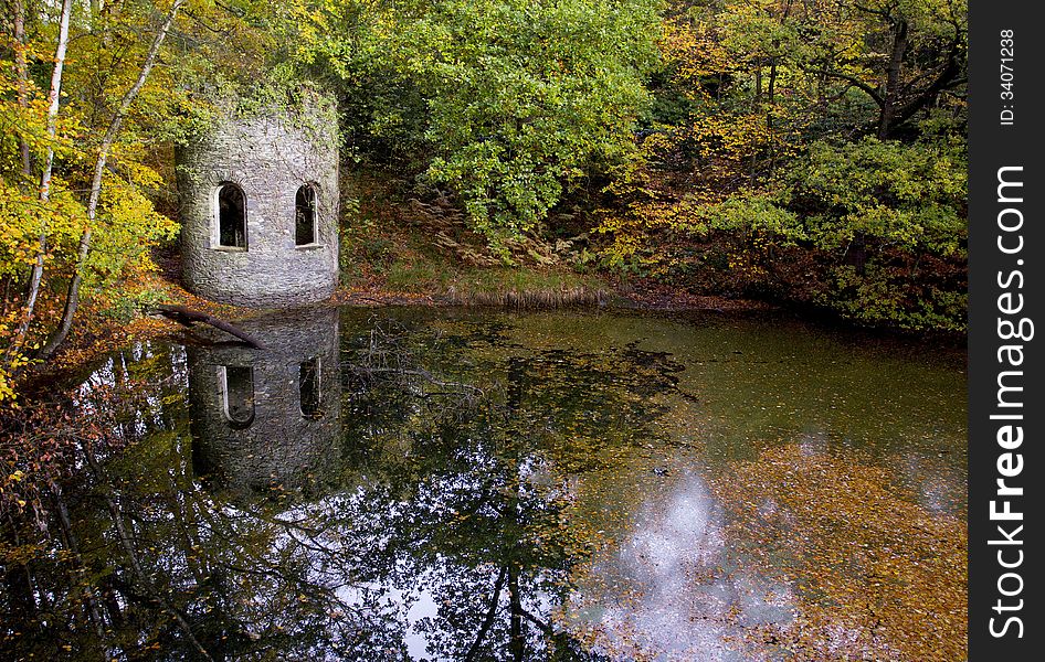 Autumn Leaves around a Victorian Folly and Old Quarry Pond, Woodhouse Eaves, Leicestershire