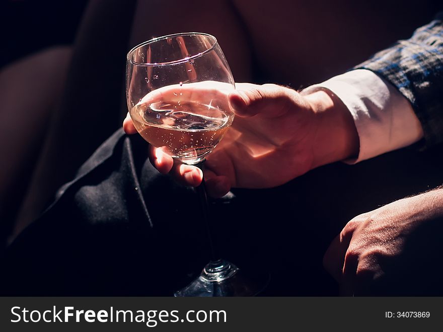 Man Hand Holding A Glass Of Champagne