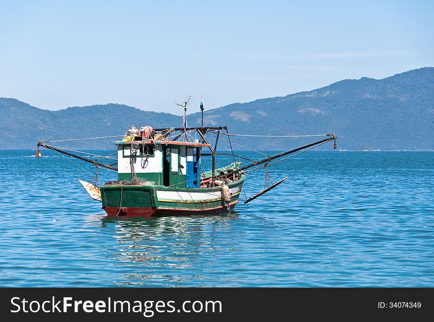 Fisherman boat in the bay near Ilha Grande island in Brazil.