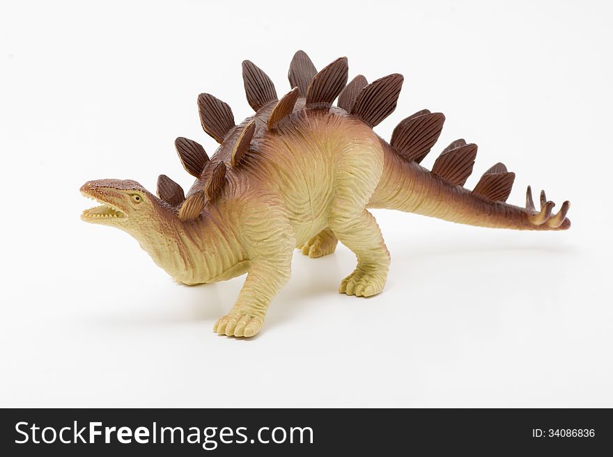 Toy Stegosaurus on a white background. Toy Stegosaurus on a white background.