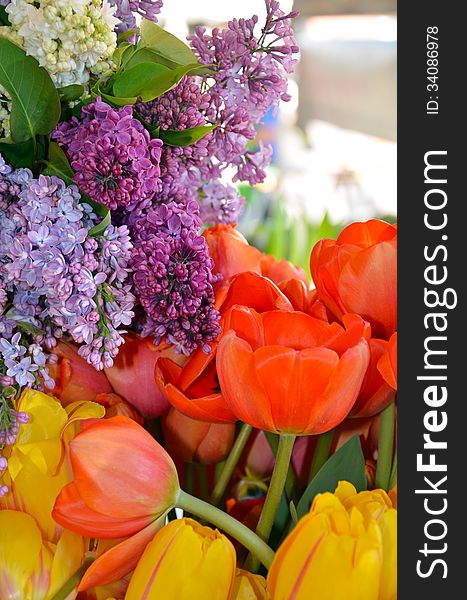 Spring lilac and tulips spring bouquet at flower market. Spring lilac and tulips spring bouquet at flower market