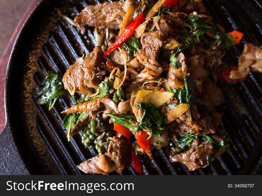 Spicy pan fried meat thai style green pepper