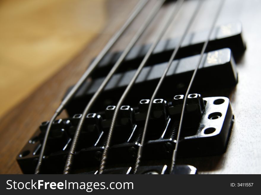 Close up of a warwick 5 string bass guitar. Close up of a warwick 5 string bass guitar