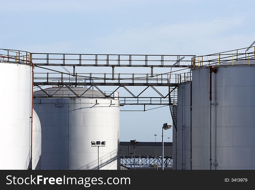 Large storage tanks on a clear day