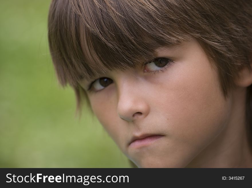 Young boy with unhappy face