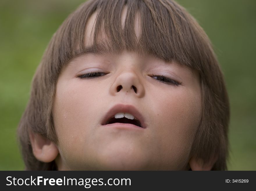 Young boy with unhappy face, injury boy