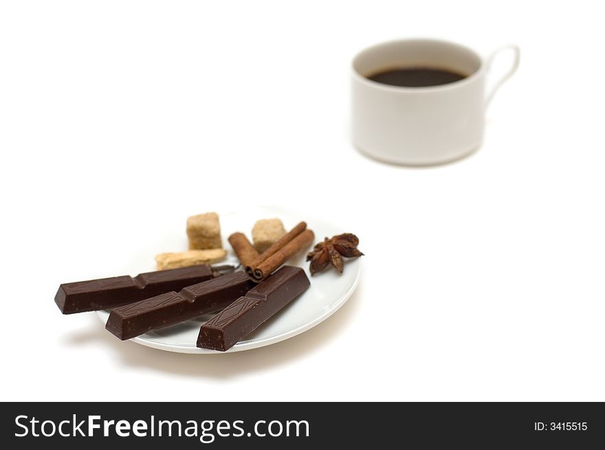 Hot cup of coffee with chocolate and cinnamon. Hot cup of coffee with chocolate and cinnamon