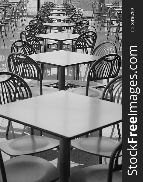 Interior design of food court in a shopping mall. Black and white. Interior design of food court in a shopping mall. Black and white.