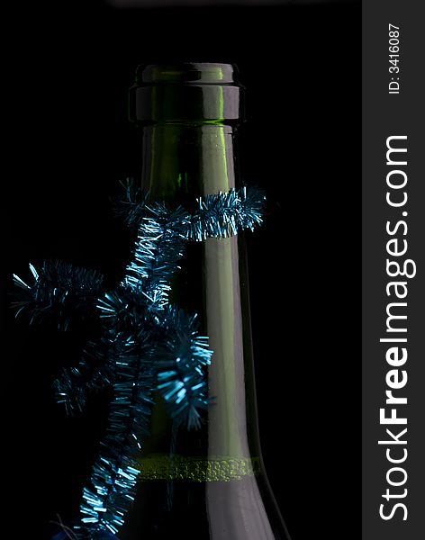 An adorned bottleneck. Concept for new years r christmas party. An adorned bottleneck. Concept for new years r christmas party