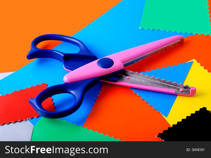 Colourful paper and scissors