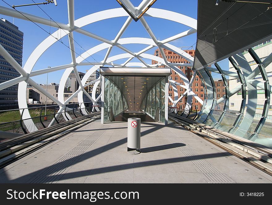 Modern railway station platform in the suburbs of The Hague, Holland. Modern railway station platform in the suburbs of The Hague, Holland