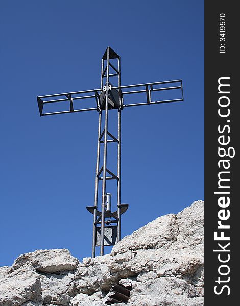 Cross on the summit of a mountain. Cross on the summit of a mountain
