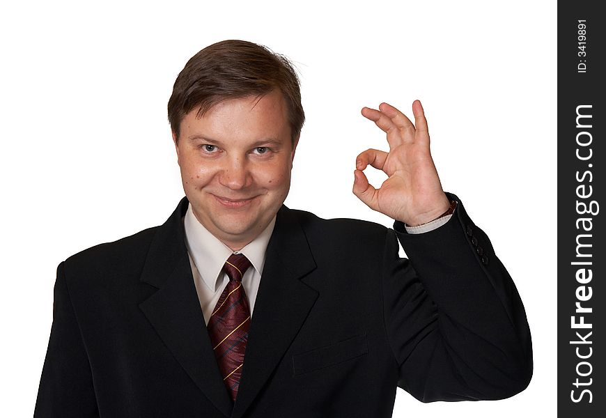 Businessman Holding Up An OK