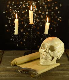 Candelabra With Skull And Letter Stock Photos