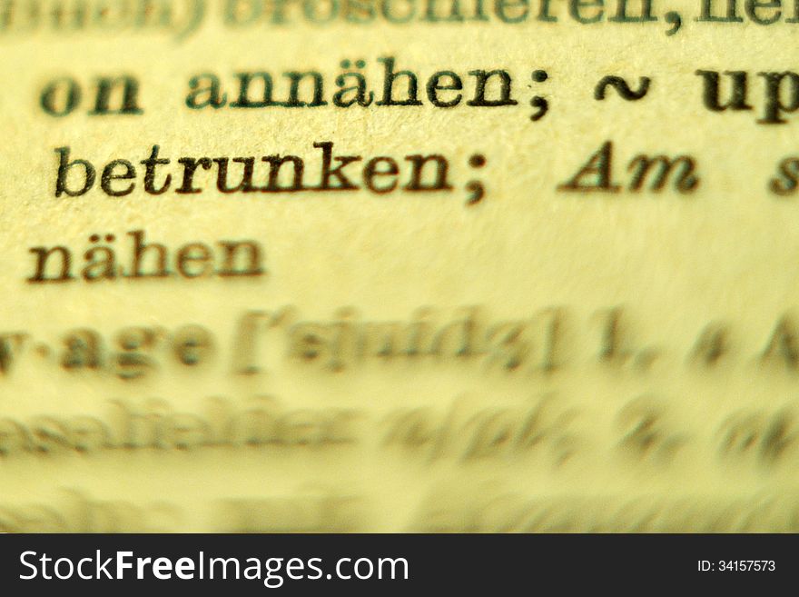 Detail shot of a german dictionary. The only non blurred word there says betrunken, which means drunk. Detail shot of a german dictionary. The only non blurred word there says betrunken, which means drunk.