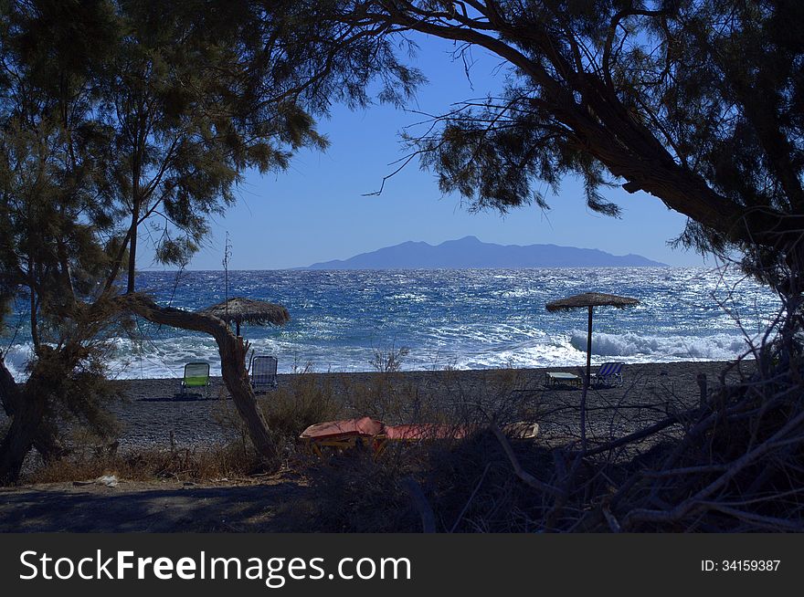 Peaceful morning beach Santorini Greece