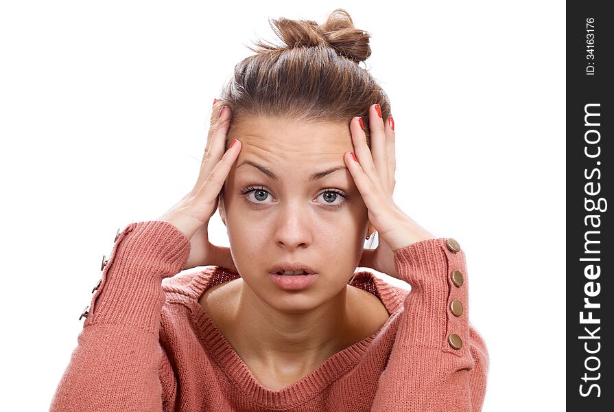 Young woman with headache, holding his hands to his head