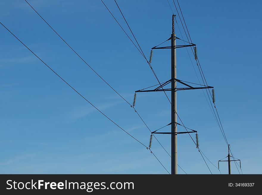 High voltage Power line on sky background. High voltage Power line on sky background