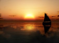 Yacht In The Sea At Sunset Stock Photo
