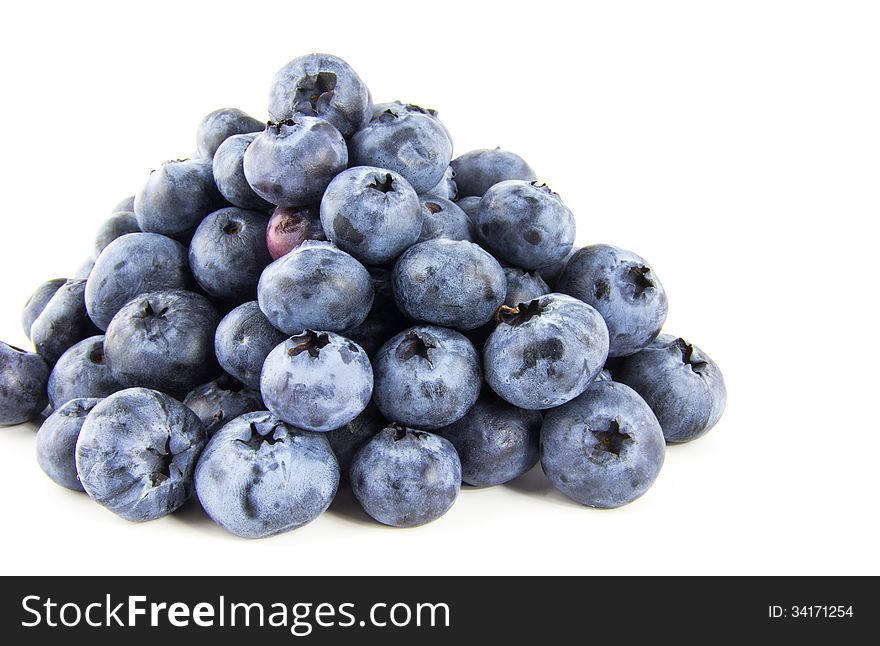 Pyramid of fresh blueberries isolated on white background