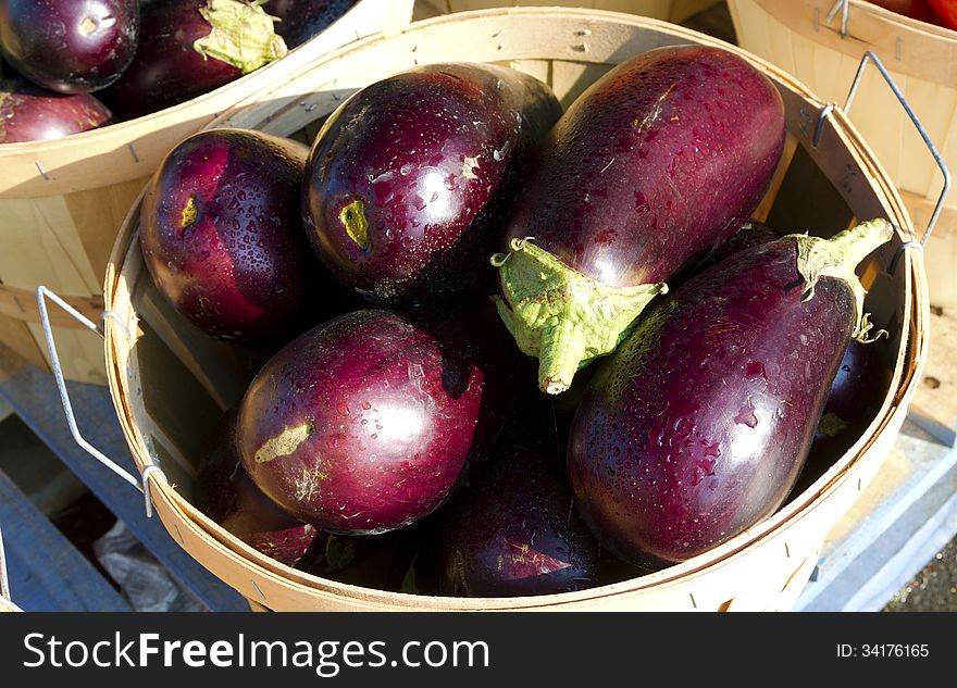 A basket of eggplants close-up
