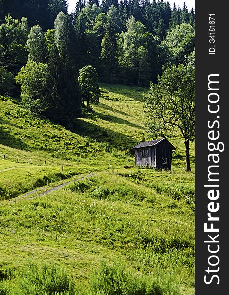 An old wooden barn in the alps mountains, Austria,