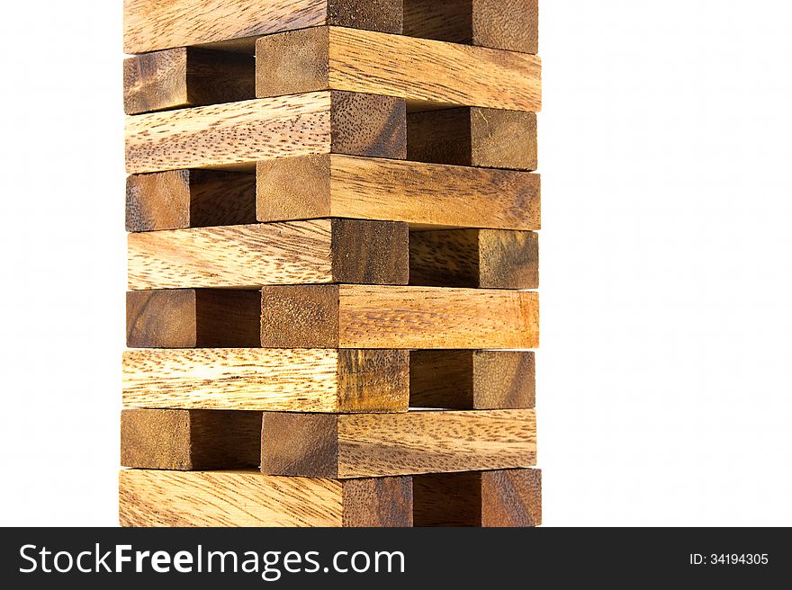 Traditional asian wooden tower block game isolated on white