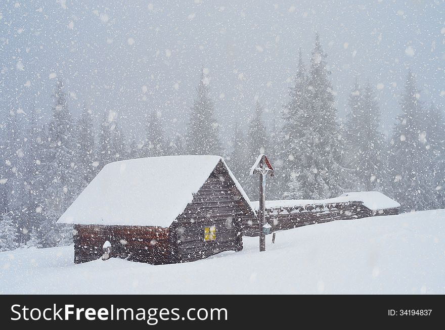 Wooden Hut In The Mountains