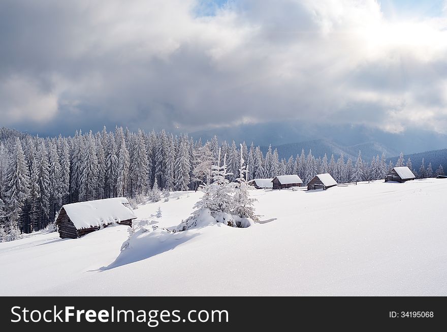 Mountain landscape with snow-covered valley. Carpathians, Ukraine. Mountain landscape with snow-covered valley. Carpathians, Ukraine
