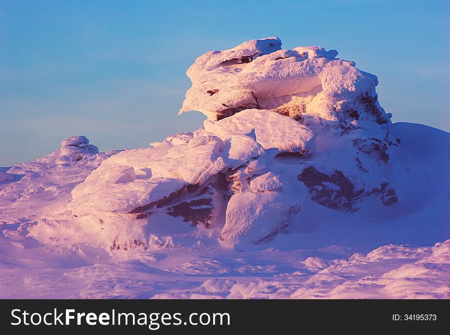 Winter landscape in the mountains with the morning light. Carpathians, Ukraine. Winter landscape in the mountains with the morning light. Carpathians, Ukraine