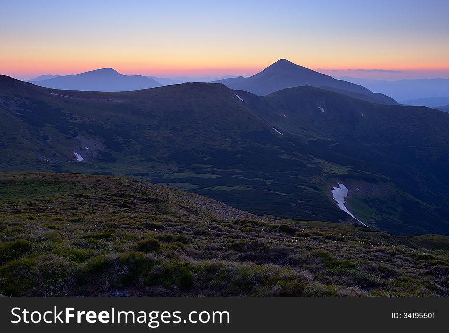 Mountain landscape after sunset. Twilight in the mountains