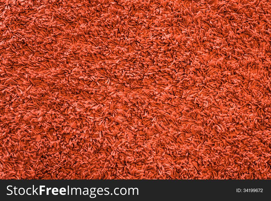 Close up or a red fabric for carpets. Close up or a red fabric for carpets.