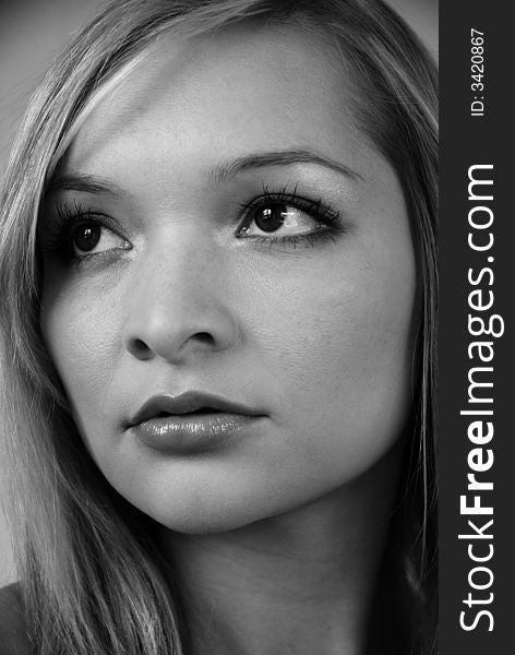 Black and white portrait of stunning young woman. Black and white portrait of stunning young woman.