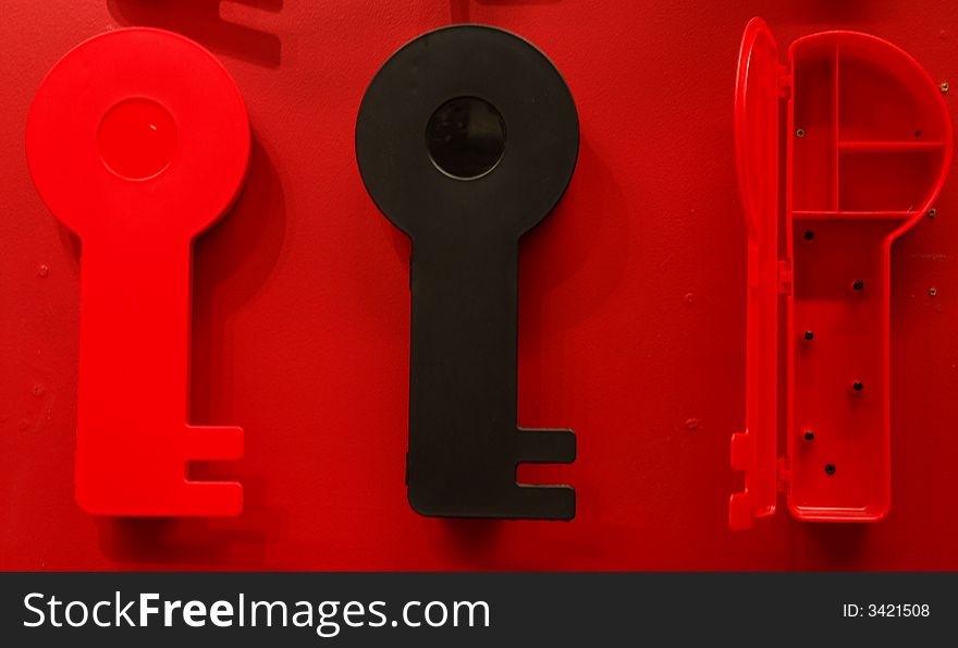 Key closed-up  on red background