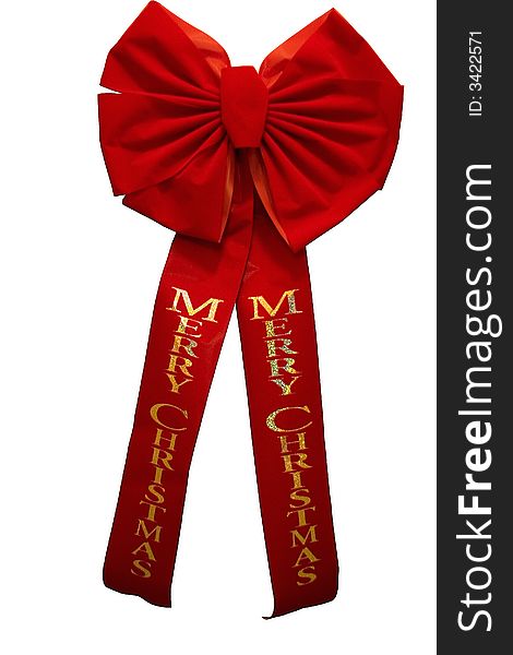 Red bow and ribbons with gold lettering that says Merry Christmas. Red bow and ribbons with gold lettering that says Merry Christmas