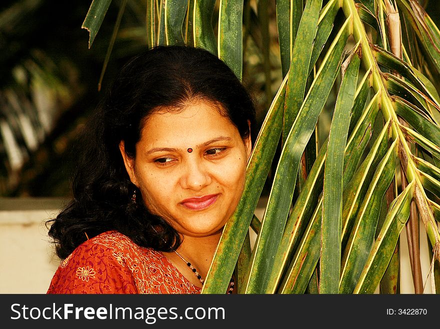 A portrait of woman getting peace and happiness in the company of nature. A portrait of woman getting peace and happiness in the company of nature.