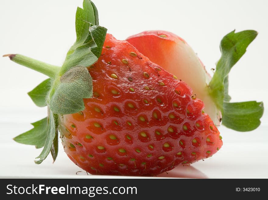 Sliced strawberry on a white backgorund