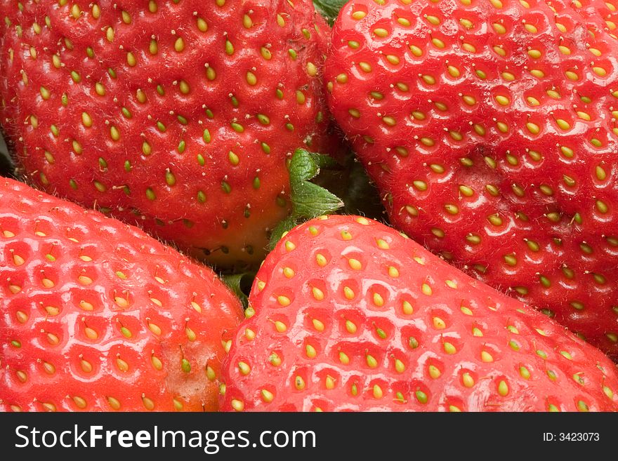 Strawberry close-up useful as background. Strawberry close-up useful as background