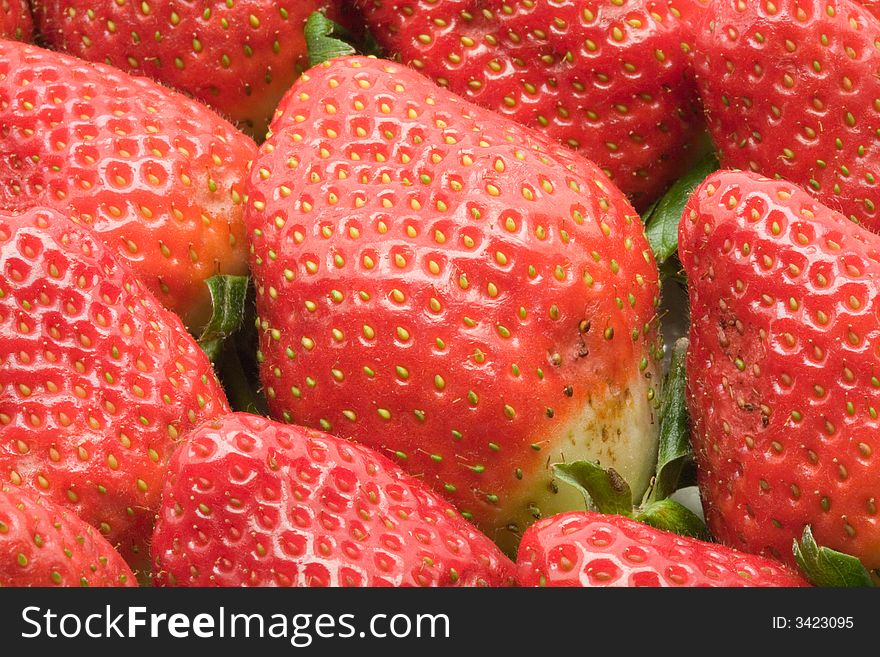 Strawberry close-up useful as background. Strawberry close-up useful as background