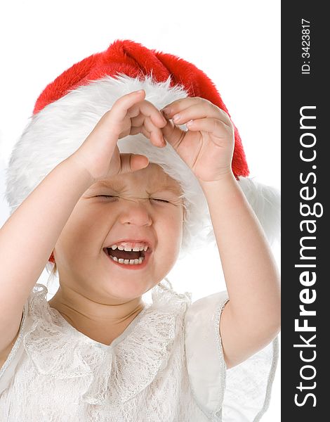 Pretty baby in santa claus christmas red hat over white background. Pretty baby in santa claus christmas red hat over white background