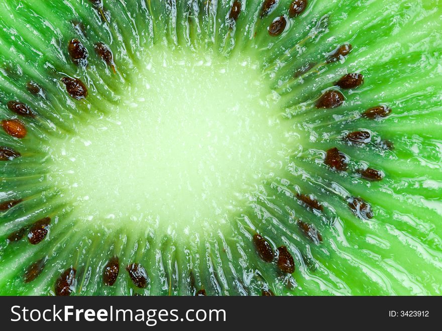 Close-up of a fresh kiwi for backgrounds. Close-up of a fresh kiwi for backgrounds