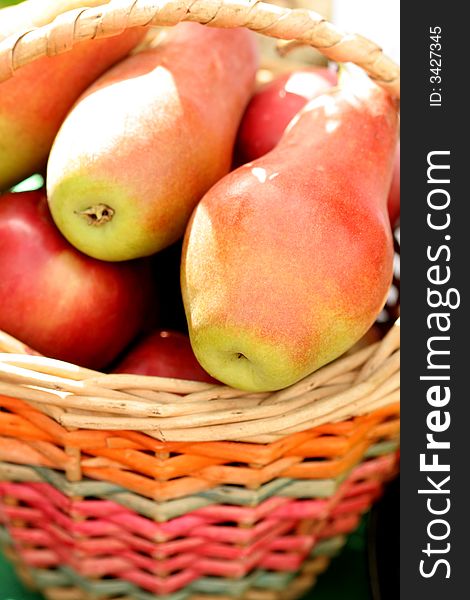 Ripe Fresh Pears In A Basket