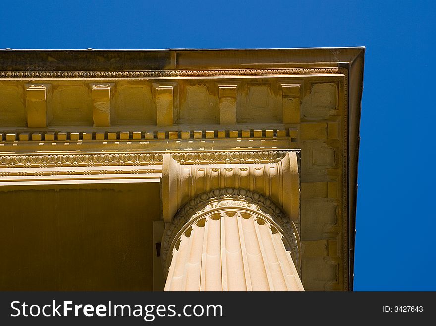 Classical Ionic Capital and column detail in perspective towards blue sky. Art Gallery of NSW, Australia