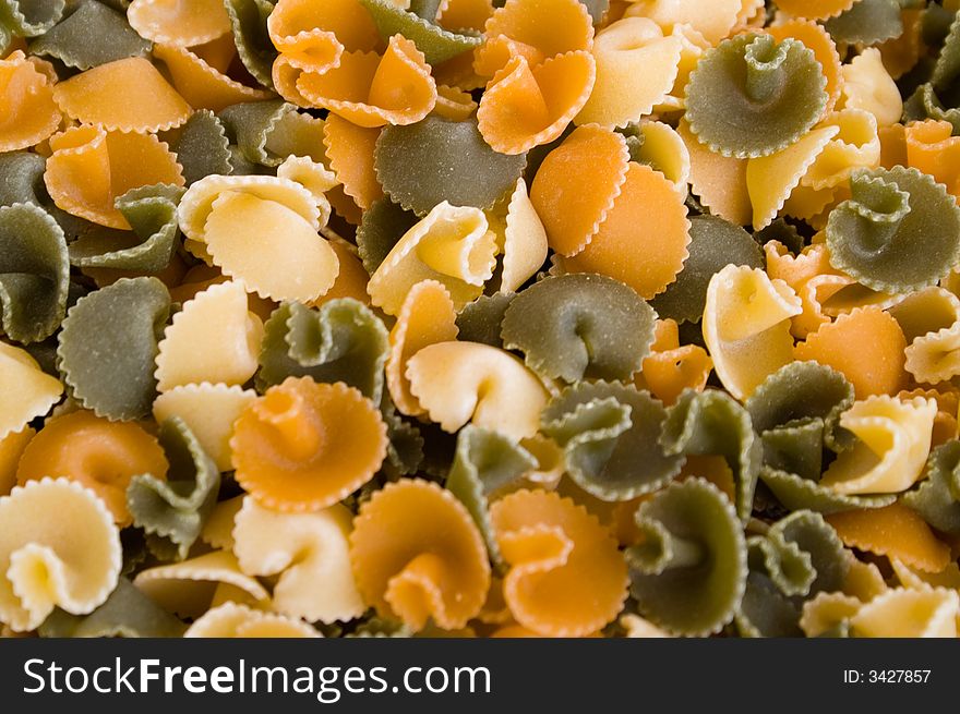 Multi color raw Macaroni Background. Multi color raw Macaroni Background