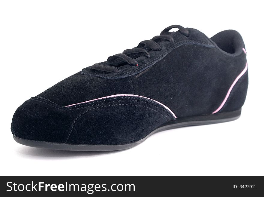 Black gym shoe on white background. Black gym shoe on white background